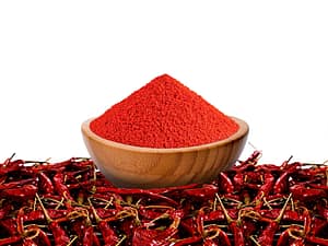 Bowl with red chili powder on transparent PNG background.