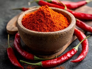 Red chilli Powder with bowl and dry chillis